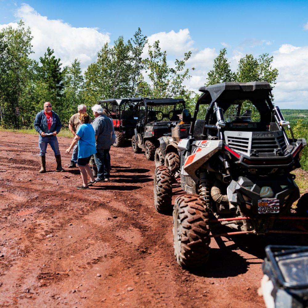 ATV riders stop at an overlook in the Iron Range Off Highway Vehicle Recreation Area in Gilbert, MN