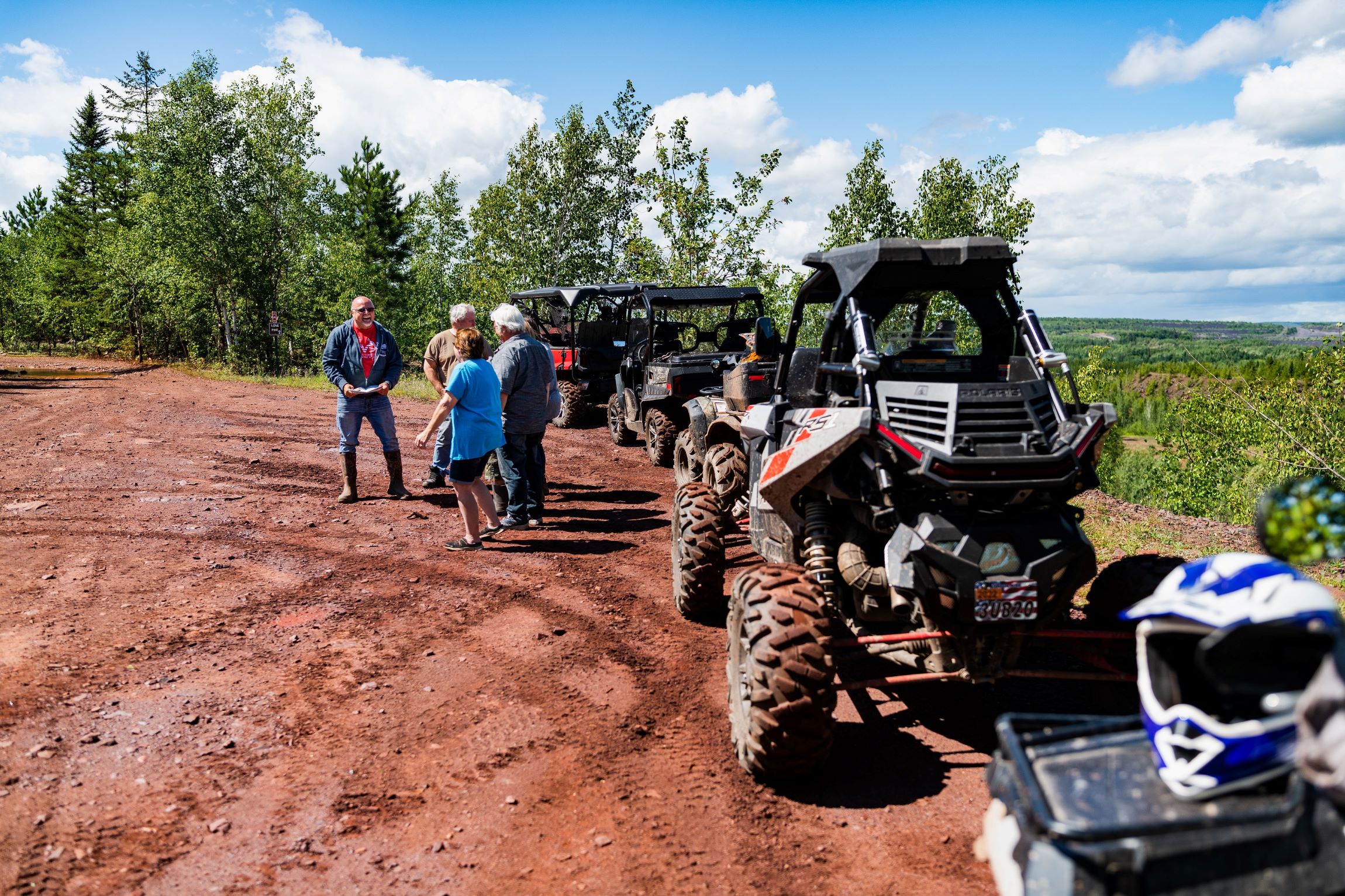 ATV riders stop at an overlook in the Iron Range Off Highway Vehicle Recreation Area in Gilbert, MN