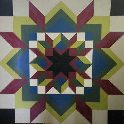 Double Carpenter’s Wheel - Tourist Senior Center | 1202 E Howard St. - Debbie Nehring Barker