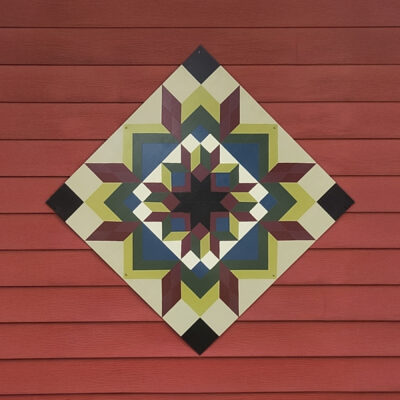 Double Carpenter’s Wheel - Tourist Senior Center | 1202 E Howard St. - Debbie Nehring Barker