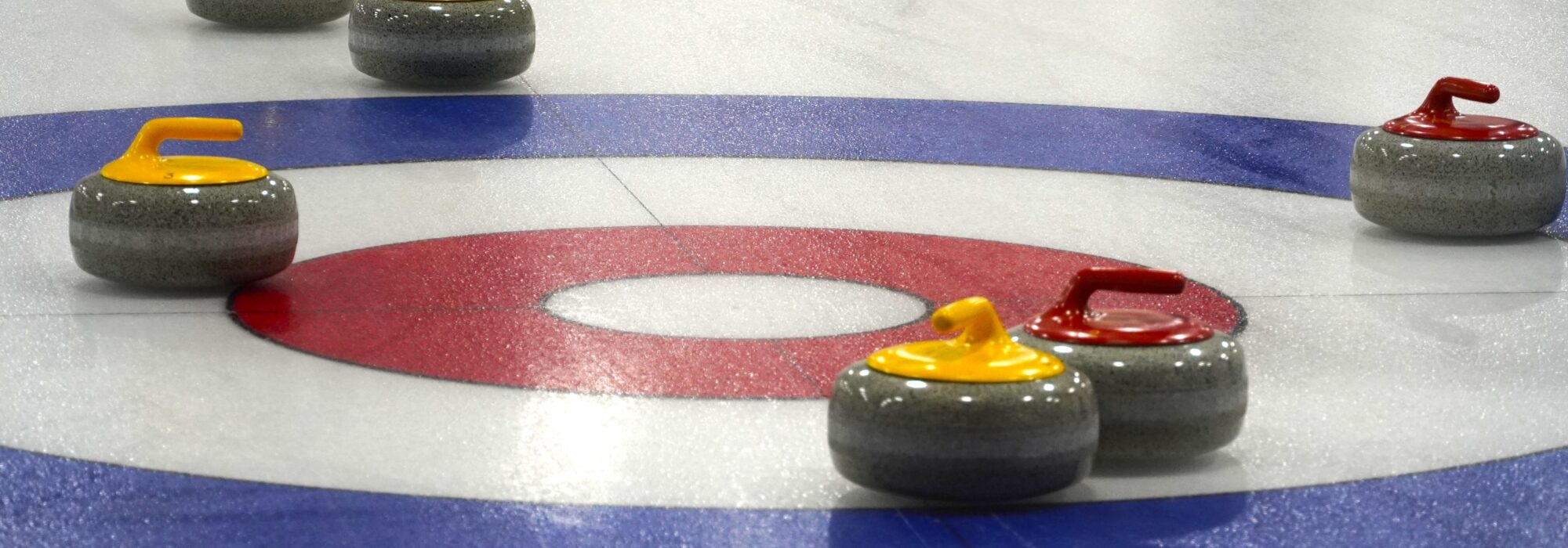 Curling Rocks and House