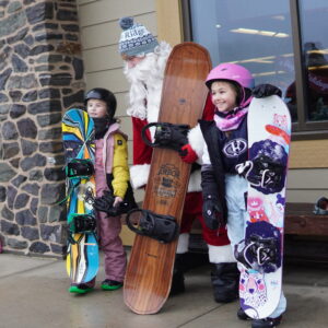 Giants Ridge Santa snowboard with kids photo