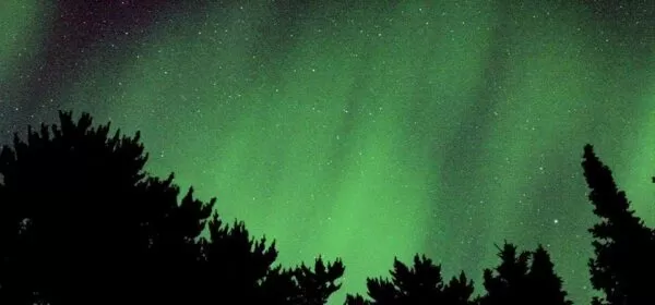 northern lights glow green in Minnesota