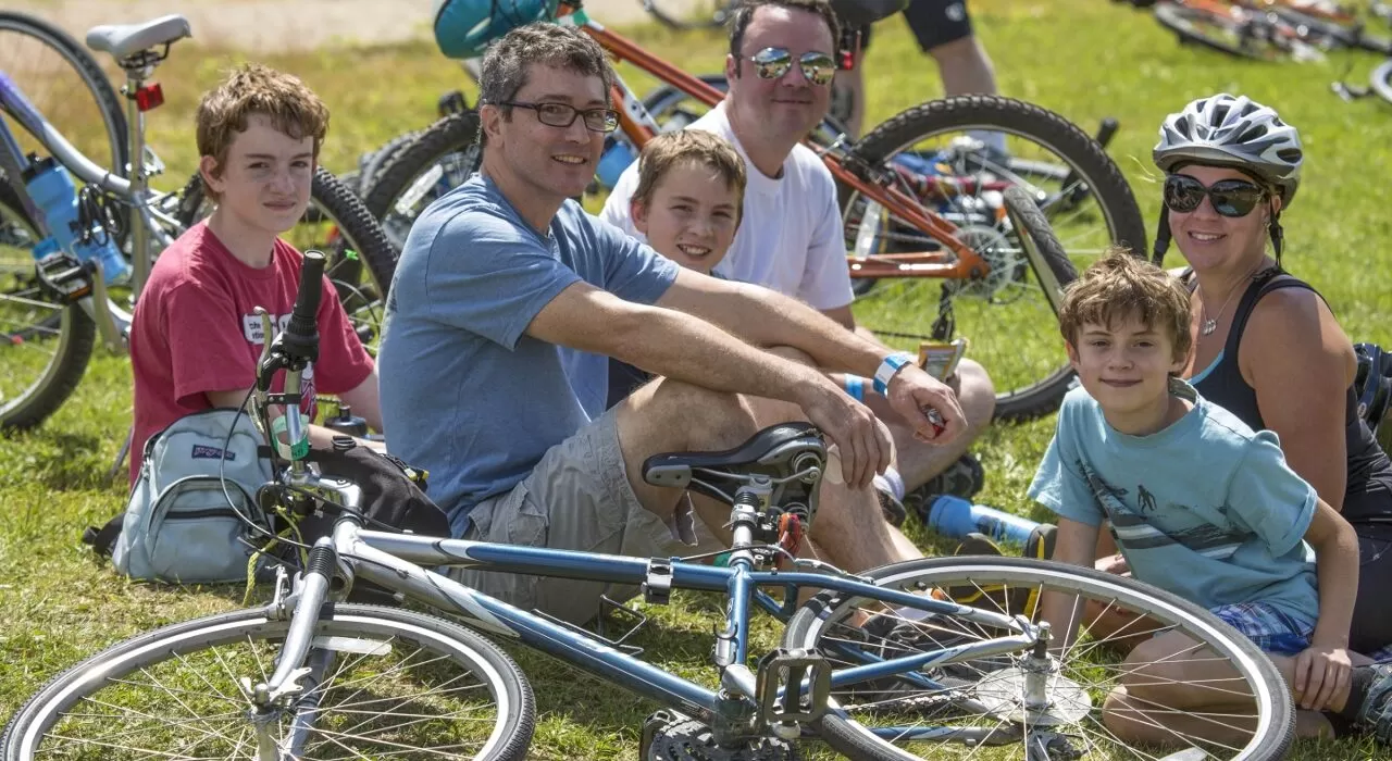 Riders take a break from cycling the Mesabi Trail