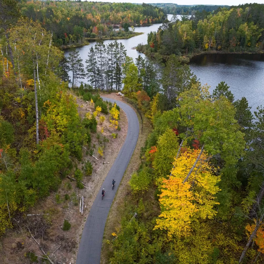 Cyclists ride the Mesabi Trail in northern Minnesota