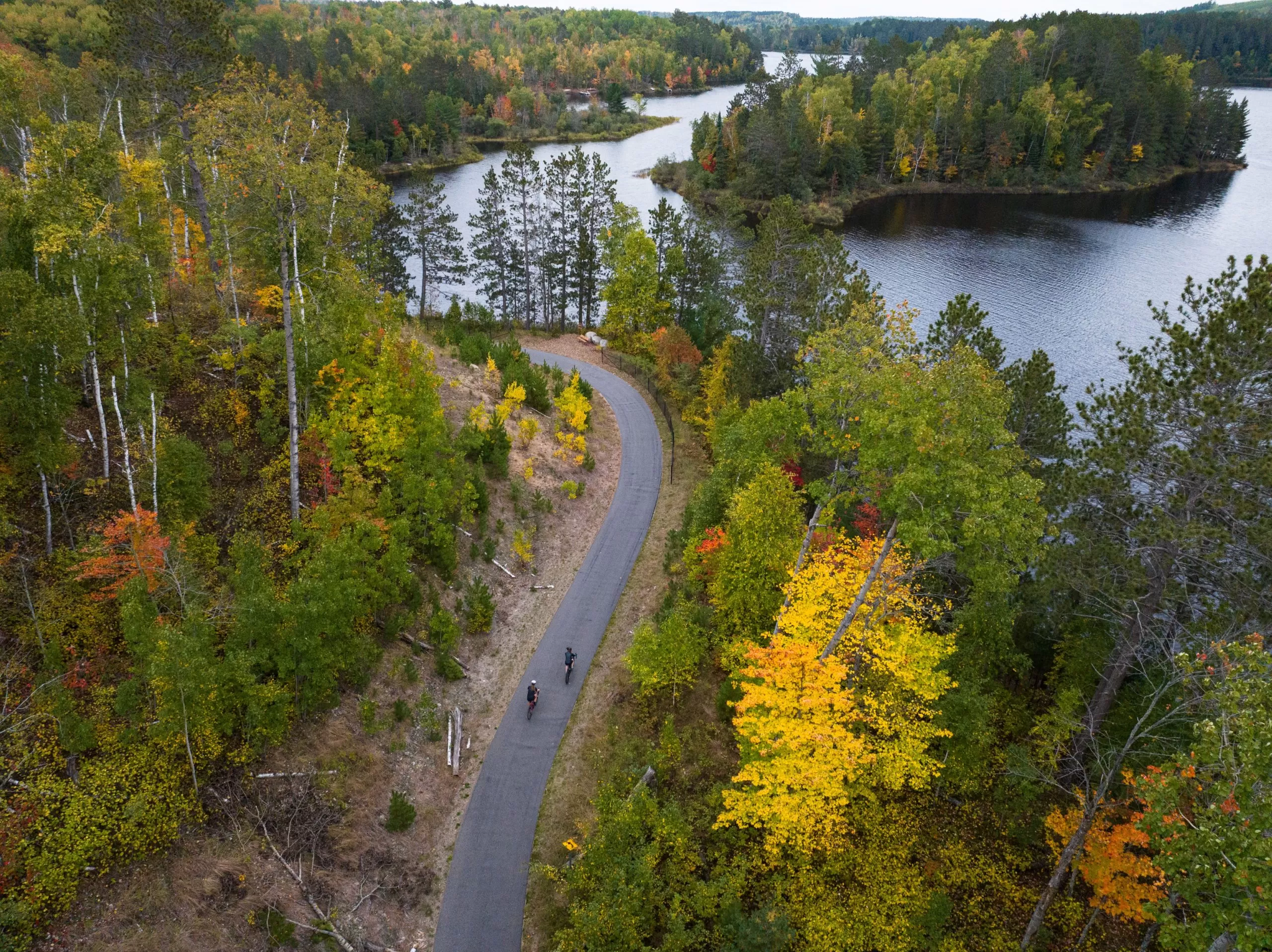 Cyclists ride the Mesabi Trail in northern Minnesota