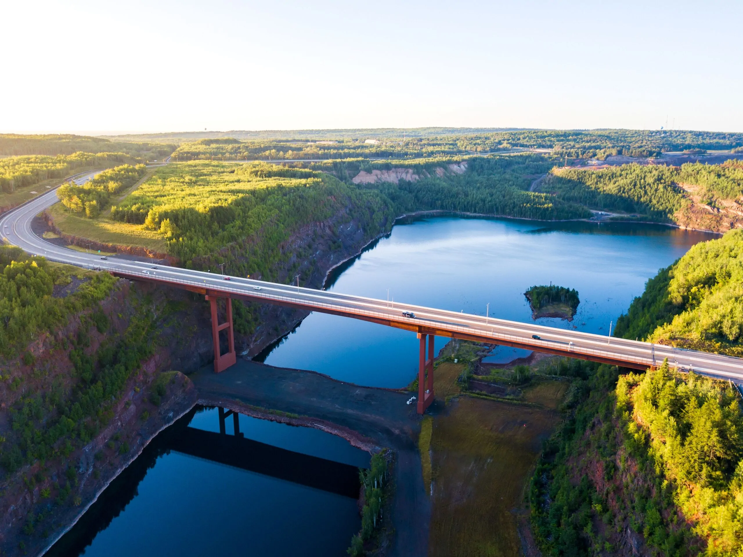 Minnesota's tallest bridge is shown in Virginia, MN spanning a former mine pit that serves as the city's water source.